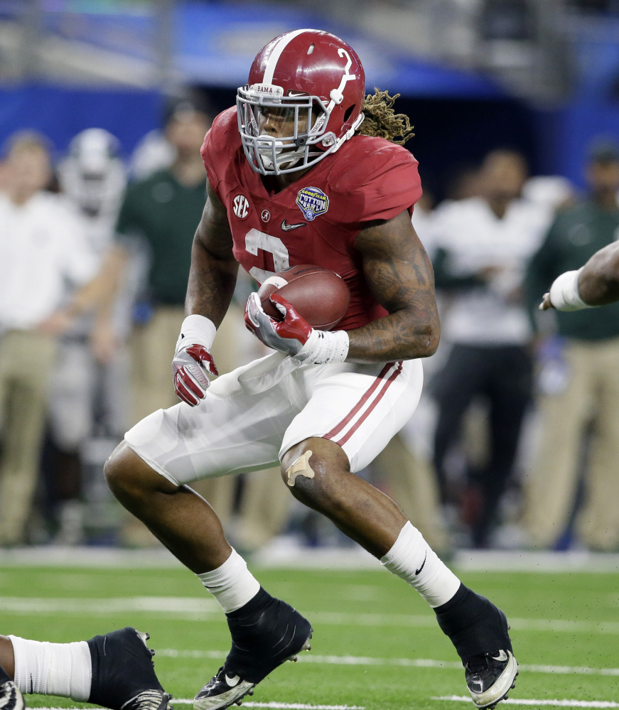 Alabama running back Derrick Henry runs the ball against Michigan State in the Cotton Bowl on Dec. 31 in Arlington, Texas. The Associated Press