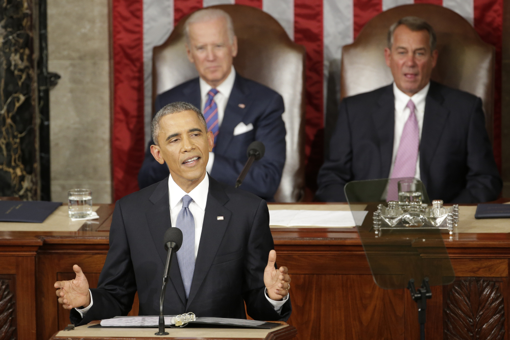 In this Jan. 20, 2015 file photo, President Barack Obama gives his State of the Union address before a joint session of Congress on Capitol Hill in Washington as Vice Presient Joe Biden and House Speaker John Boehner of Ohio listen.