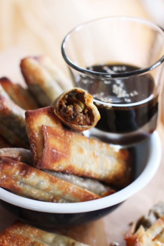 Baked egg rolls with sesame-soy dipping sauce. (AP Photo/Matthew Mead)