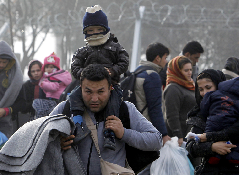 Migrants crossing the border from Greece walk toward a transit center near the Macedonian town of Gevgelija on Monday. Europe alone has 76 million international migrants.