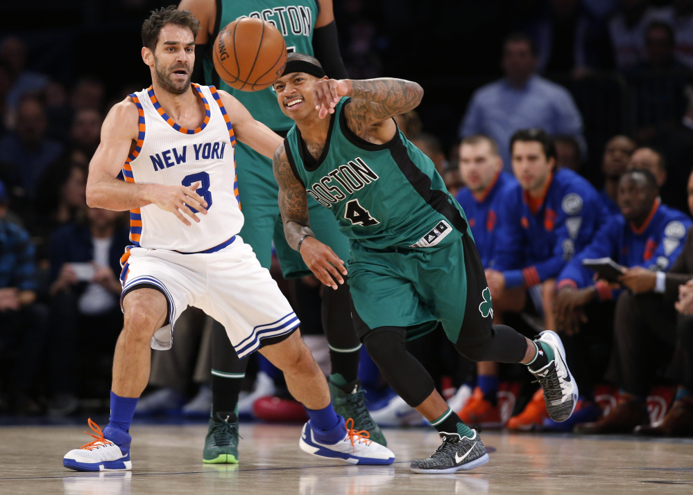 Knicks guard Jose Calderon watches as Celtics guard Isaiah Thomas goes after the ball after Calderon stripped it from Thomas in the first half of New York’s home win Tuesday night.