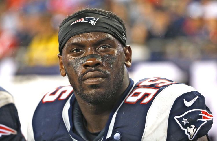 New England Patriots defensive end Chandler Jones arrived shirtless at the back door of the Foxborough (Mass.) Police Department on Saturday. The Associated Press
