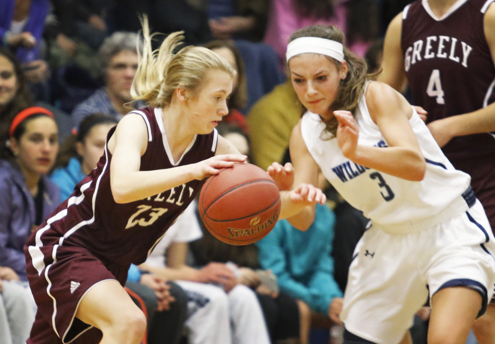 Greely’s Anna DeWolfe drives against Lily Posternak of York during their Class A South girls’ basketball game Friday in York. DeWolfe scored 19 points, but York improved to 12-0 with a 69-66 victory.