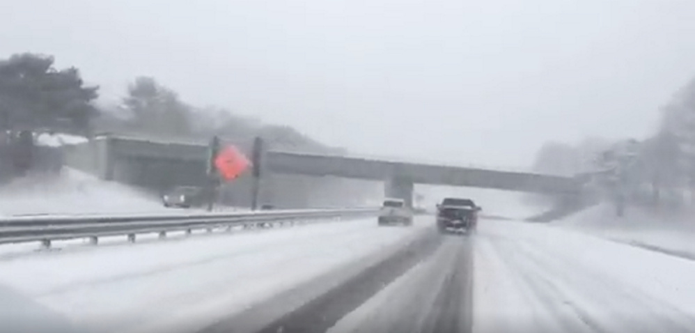 Snow makes driving tricky on the Maine Turnpike just south of the York tolls at about 11:15 a.m. Saturday.