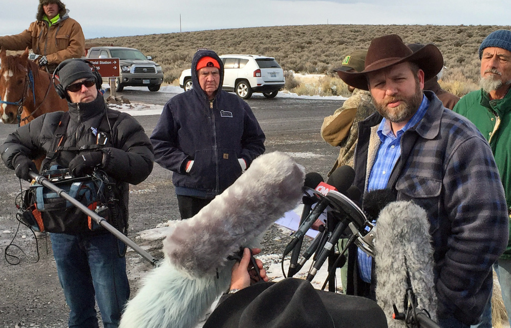 Ammon Bundy speaks to reporters at the Malheur National Wildlife Refuge in Burns, Ore., on Thursday, as the standoff over the disposition of public lands continues.