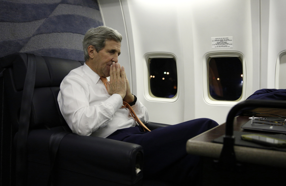 U.S. Secretary of State John Kerry arrives from Vienna at Joint Base Andrews in Washington on Sunday. 