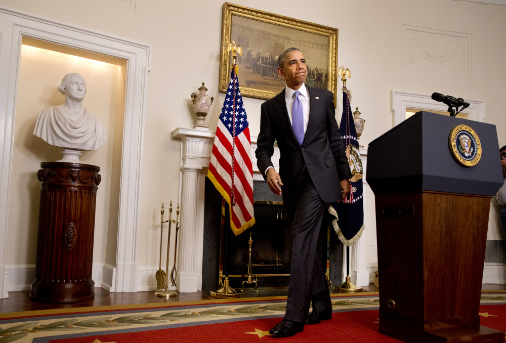 President Obama leaves the podium after speaking about the release of Americans by Iran, on Sunday at the White House.