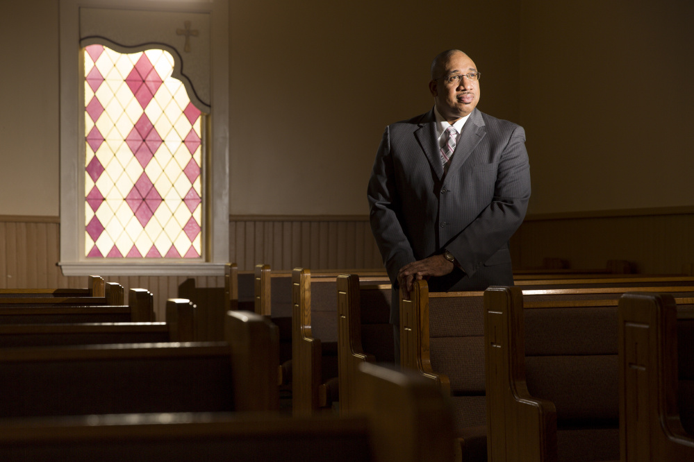 The Rev. Kenneth Lewis of Green Memorial AME Zion Church in Portland, seen at the church in January, will host Tuesday's community gathering.
Ben McCanna/Staff Photographer