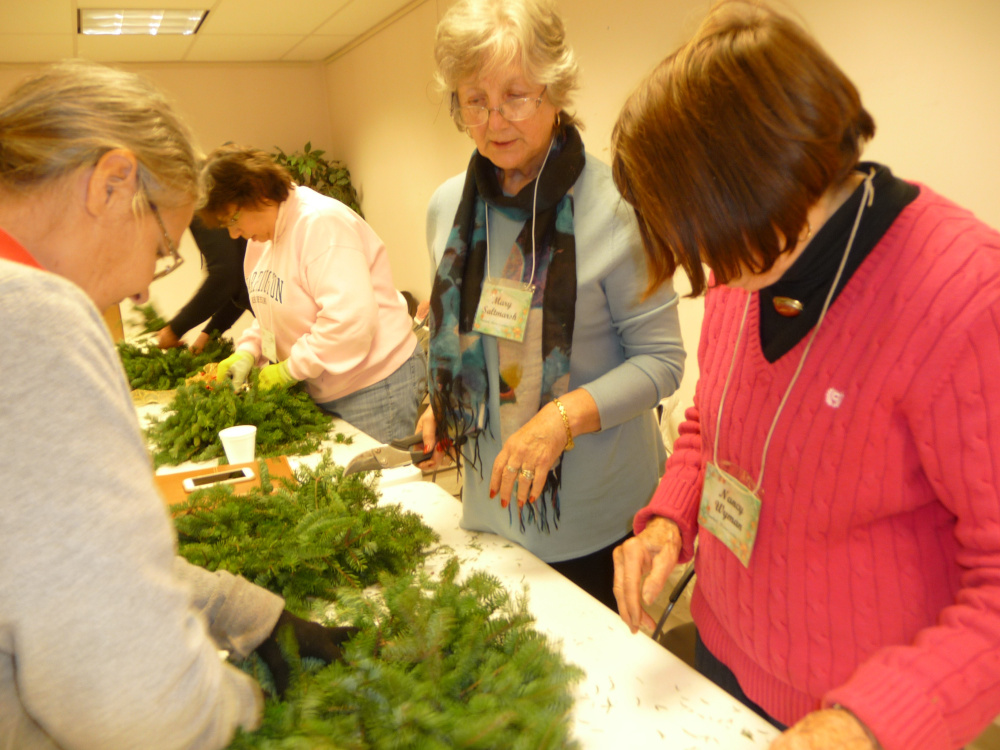 Members of the Southern Maine Garden Club participate in an evergreen wreath making workshop during the Christmas season.The group will gather again on Wednesday to learn about planting blueberries, raspberries and peaches. Photo courtesy Donna Claveau
