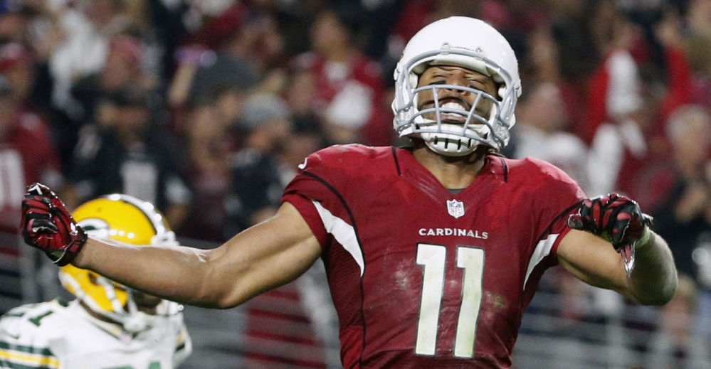 Larry Fitzgerald’s 75-yard yard reception to start overtime set up his 5-yard TD catch that ended a wild 26-20 win over Green Bay in the divisional round Saturday.