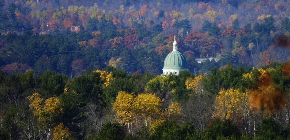 The State House dome is seen in front of Howard Hill. Augusta will hold a meeting Tuesday to discuss possible recreational uses for the property, which cost $925,000.