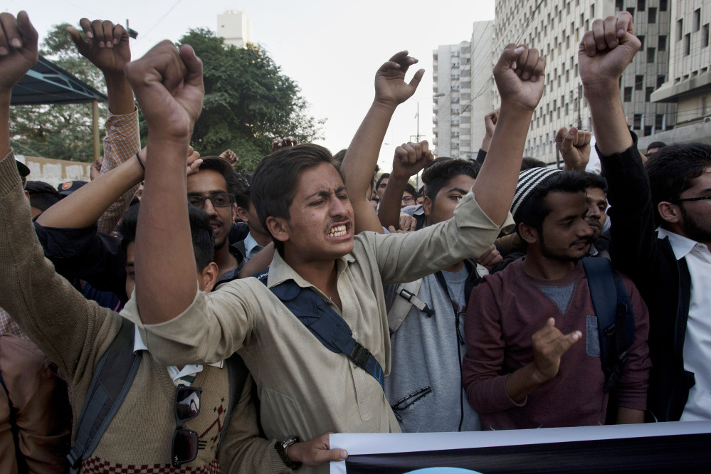 Members of the student wing of a Pakistani religious group Jamaat-e-Islami chant slogans during a demonstration in Karachi to condemn the attack by Taliban gunmen on Bacha Khan University in northwestern Pakistan on Wednesday.