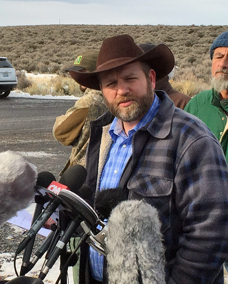 Ammon Bundy talks to reporters at Malheur National Wildlife Refuge in Burns, Ore., Thursday.