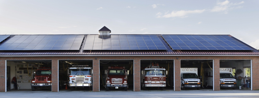 Rooftop solar, like this array on top of the Belfast Fire Department, contributes 1 percent of the power that Central Maine Power delivers.