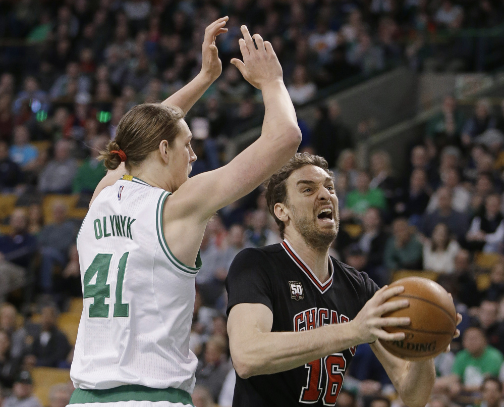Bulls center Pau Gasol drives to the basket past Celtics center Kelly Olynyk in the first quarter of the Celtics’ win Friday night in Boston.