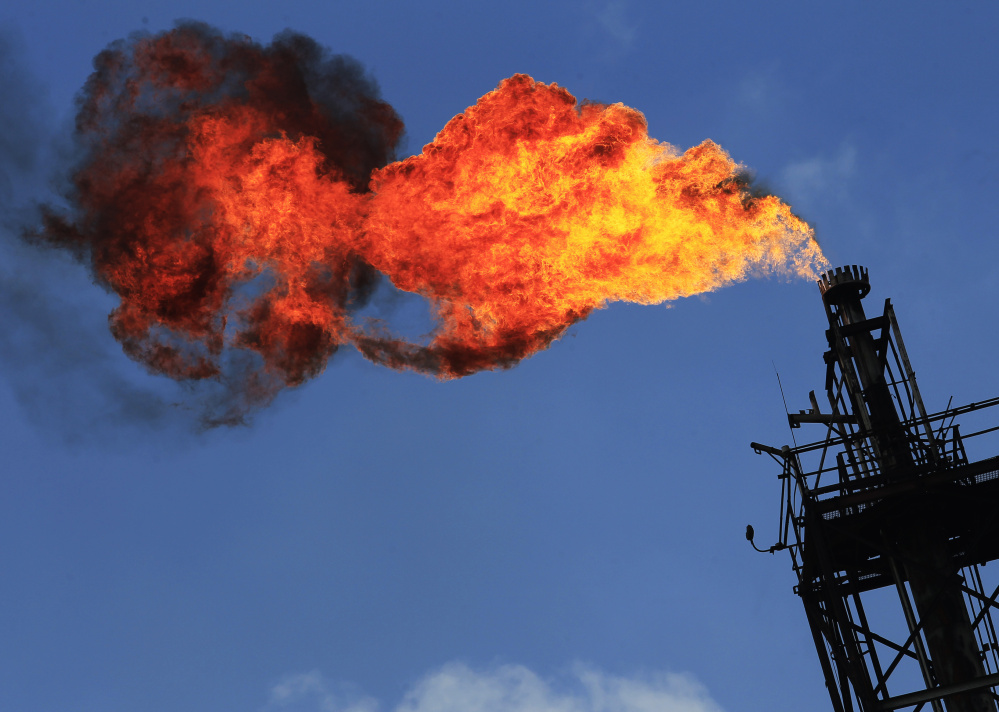 Gas is flared-off at an oil facility. Between 2009 and 2014, enough was lost through flaring, venting and leaks to power more than 5 million homes for a year.