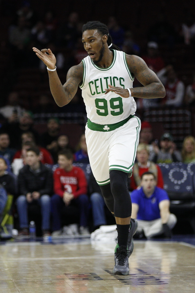 Boston’s Jae Crowder celebrates after making a 3-pointer in the first half of the Celtics’ 112-92 win over the 76ers on Sunday in Philadelphia.