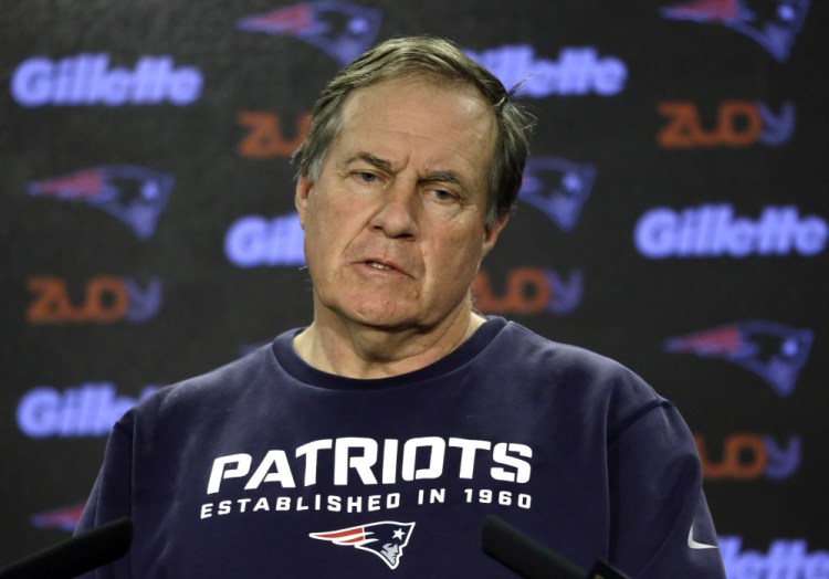 New England Patriots head coach Bill Belichick speaks at a news conference to wrap up the team’s NFL season Monday in Foxborough, Mass. The Denver Broncos beat the Patriots 20-18 in Sunday’s AFC championship game in Denver.