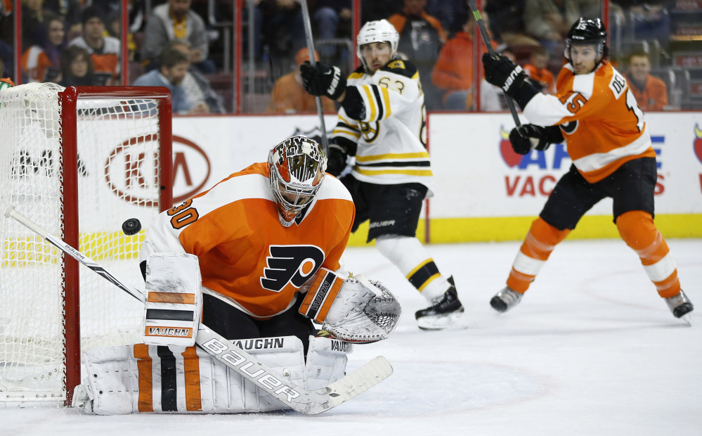 The Flyers’ Michal Neuvirth can’t stop a shot by the Bruins’ Brett Connolly with 1:54 left in the third period of Monday night’s game in Philadelphia. Boston won, 3-2, on Connolly’s goal.