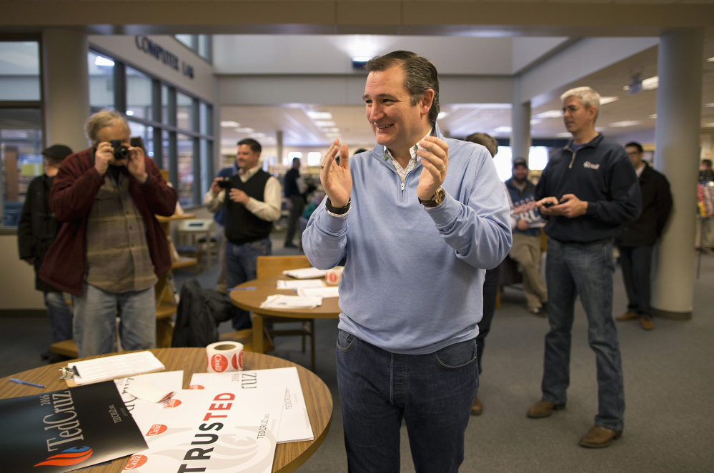 Republican presidential candidate, Sen. Ted Cruz, R-Texas, smiles during a campaign event Friday in Emmetsburg, Iowa, but some say his campaign is under siege.