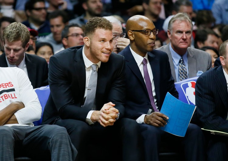 The Clippers' Blake Griffin, left, will miss 4 to 6 weeks with a broken hand after punching a member of his team's staff.