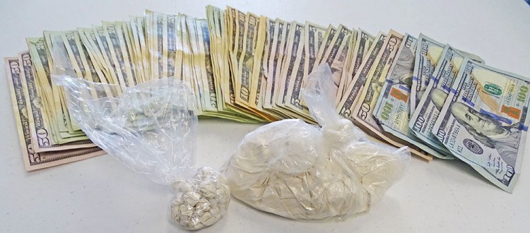 Authorities who searched the Oakland apartment early Thursday seized nearly 100 grams of heroin – the equivalent of 1,000 doses – $1,800 in cash and other evidence of drug sales. Photo provided by the Maine Public Safety Department
