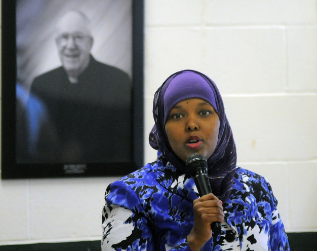 Fahmo Ahmed of Lewiston describes her migration to Maine from her native Somalia during a Martin Luther King Day forum at St. Francis Xavier Roman Catholic Church in Winthrop on Monday. 