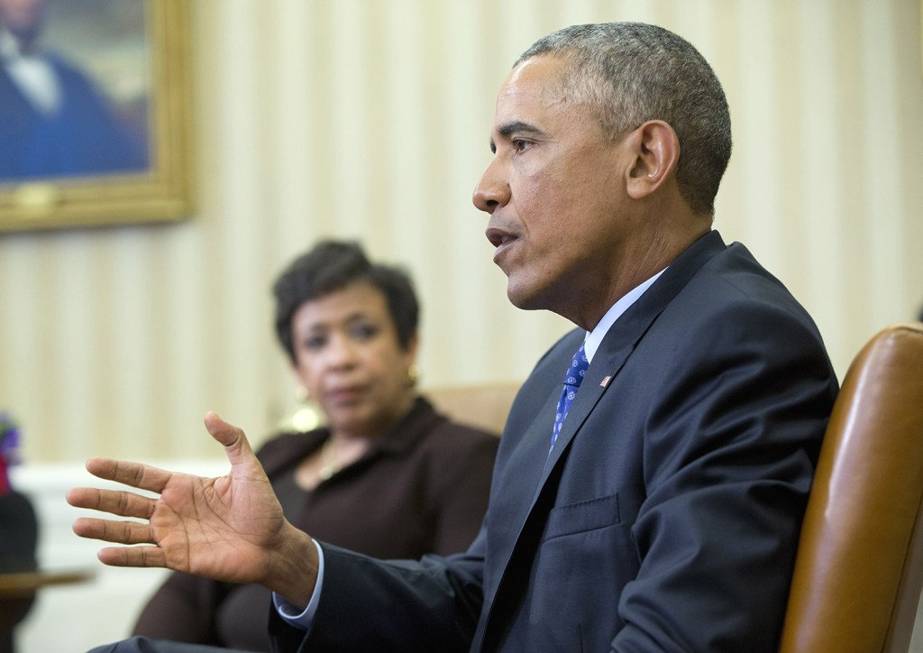 Attorney General Loretta Lynch listens as President Obama speaks in the Oval Office on Monday in a meeting with law enforcement officials to discuss executive actions the president can take to curb gun violence.
The Associated Press
