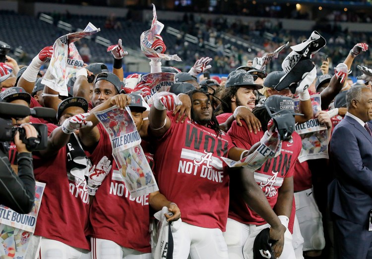 Alabama celebrates its Cotton Bowl win against Michigan State and its berth in the national championship game.
The Associated Press