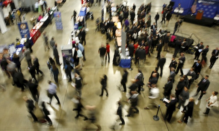Job seekers like those at this Washington job fair in January could have a better chance of scoring higher wages or better benefits as Maine's unemployment rate hits 4 percent.