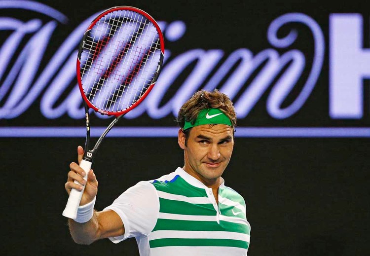 Switzerland's Roger Federer acknowledges cheers from the crowd after winning his third round match against Bulgaria's Grigor Dimitrov at the Australian Open tennis tournament at Melbourne Park, Australia, Friday. Reuters