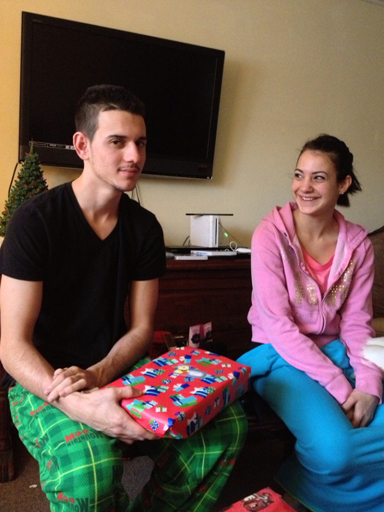 Derrick Thompson and Alivia Welch share a funny moment on Christmas Day on 2012 shortly before they were murdered by Thompson's landlord, James Pak, on Dec. 29, 2012.