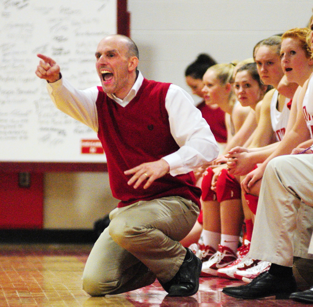 Cony coach Ted Rioux yells instructions to his Rams during a game on Feb. 4, 2014 at Cony High School in Augusta. Rioux resigned Monday.