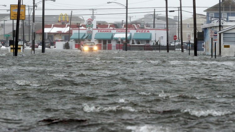 Water floods New Jersey Avenue in North Wildwood, N.J., on Jan. 23, at the height of a winter storm that created near-record high tides along the Jersey Shore.