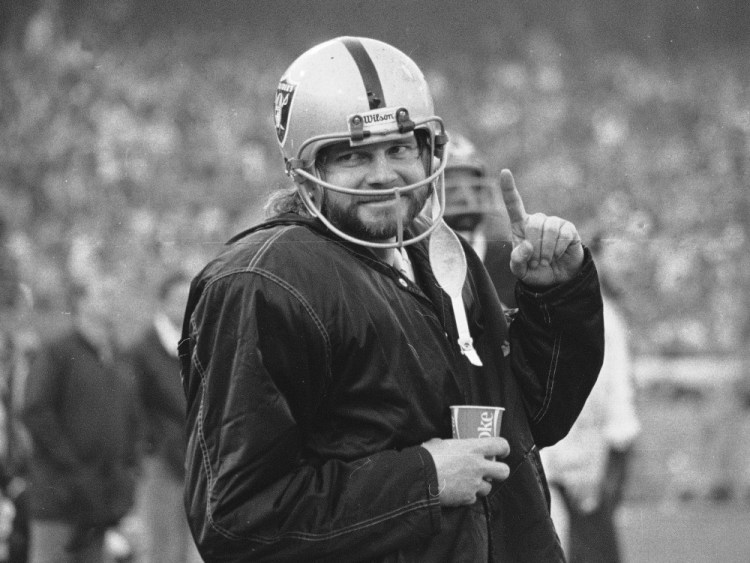 In this Dec. 27, 1976, file photo, Oakland Raiders quarterback Ken Stabler stands on the sidelines during the second half of AFC championship game against the Pittsburgh Steelers in Oakland, Calif.