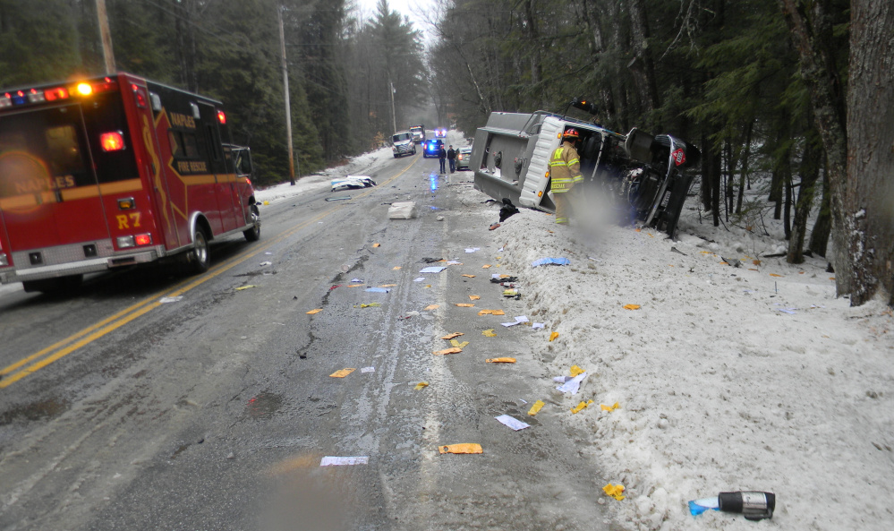 One person was injured when an oil delivery truck rolled over on Route 35 in Naples on Wednesday.