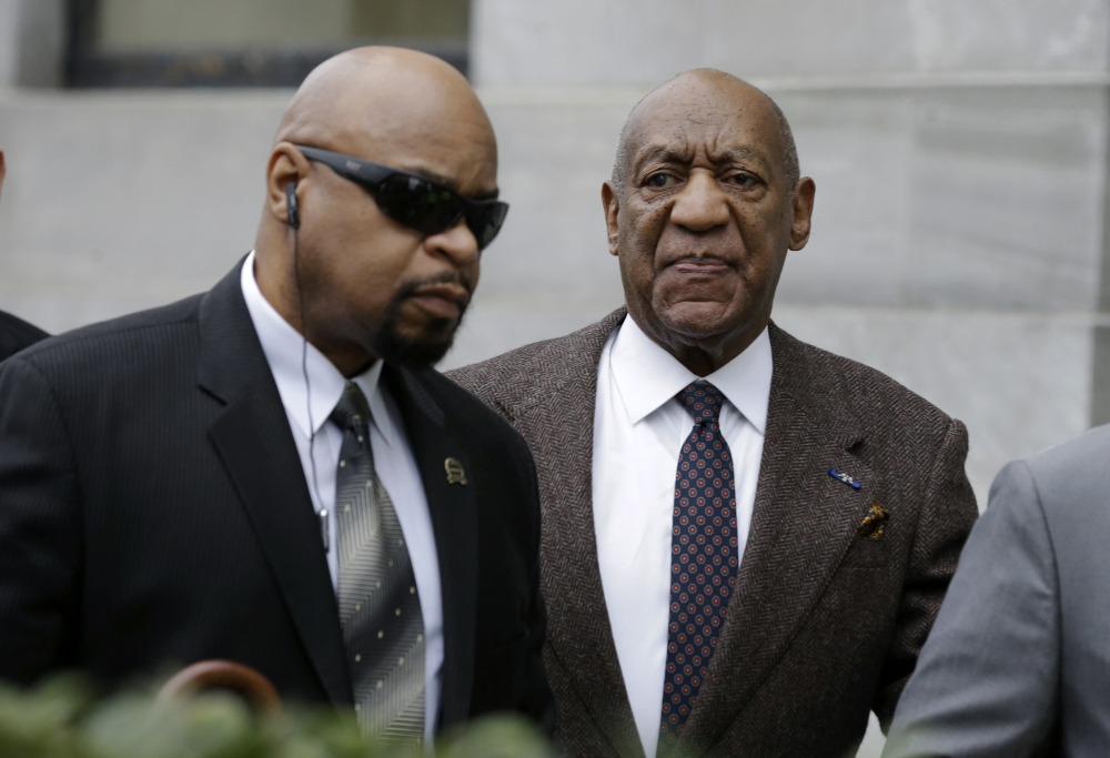Bill Cosby arrives for his court appearance Wednesday in Norristown, Pa. A judge rejected Cosby’s defense team’s motion to dismiss a sexual assault case against him over an unwritten promise of immunity that a former prosecutor says he gave Cosby’s now-deceased lawyer.