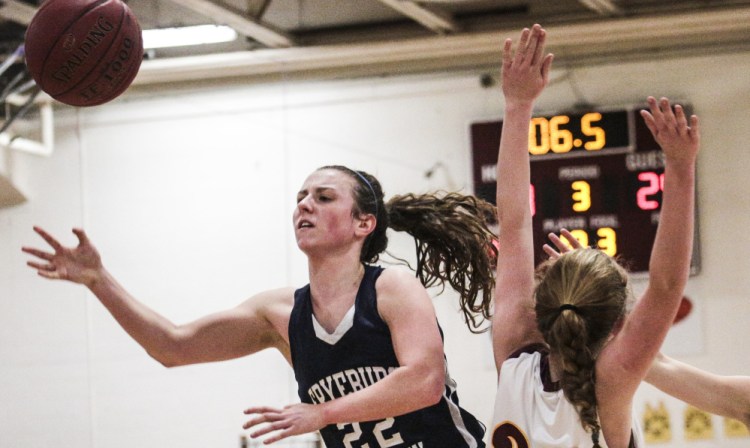 Fryeburg Academy guard Julia Quinn collides with Cape Elizabeth’s Kelly O’Sullivan while attempting to shoot Thursday in a Class A South season finale. Fryeburg won, 40-27.