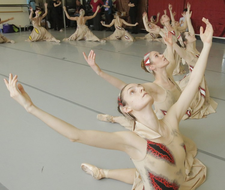 Dancers Erica Diesl, Lindsay Cregier, Kaleigh Natale and Megan McCoy, front to back, rehearse at the Portland Ballet in 2013.