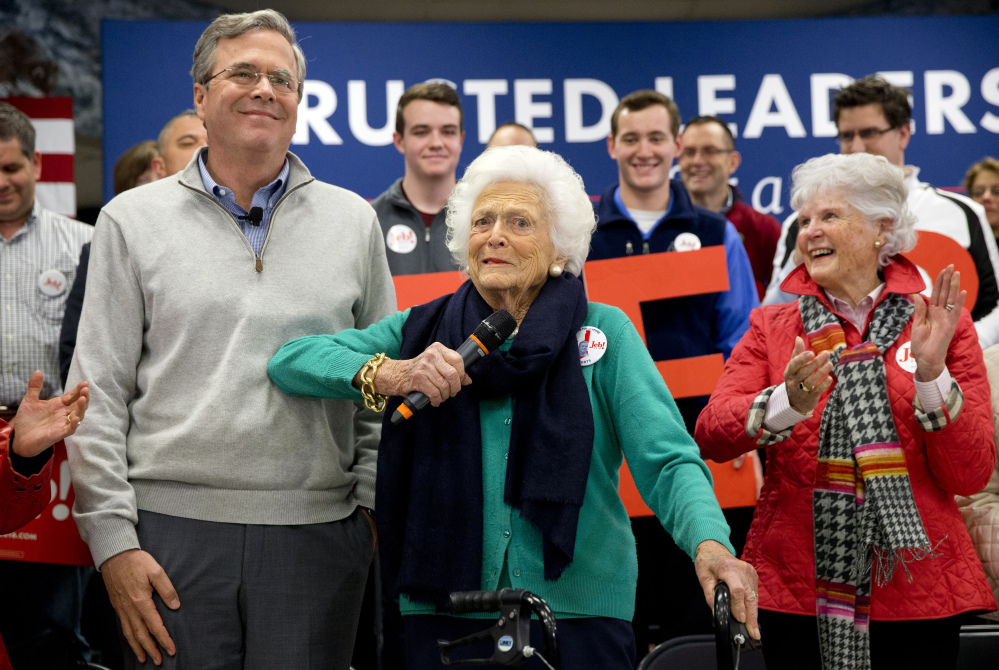 Barbara Bush jokes with her son, Republican presidential candidate, former Florida Gov. Jeb Bush, while introducing him at a town hall meeting in Derry, N.H., on Thursday.