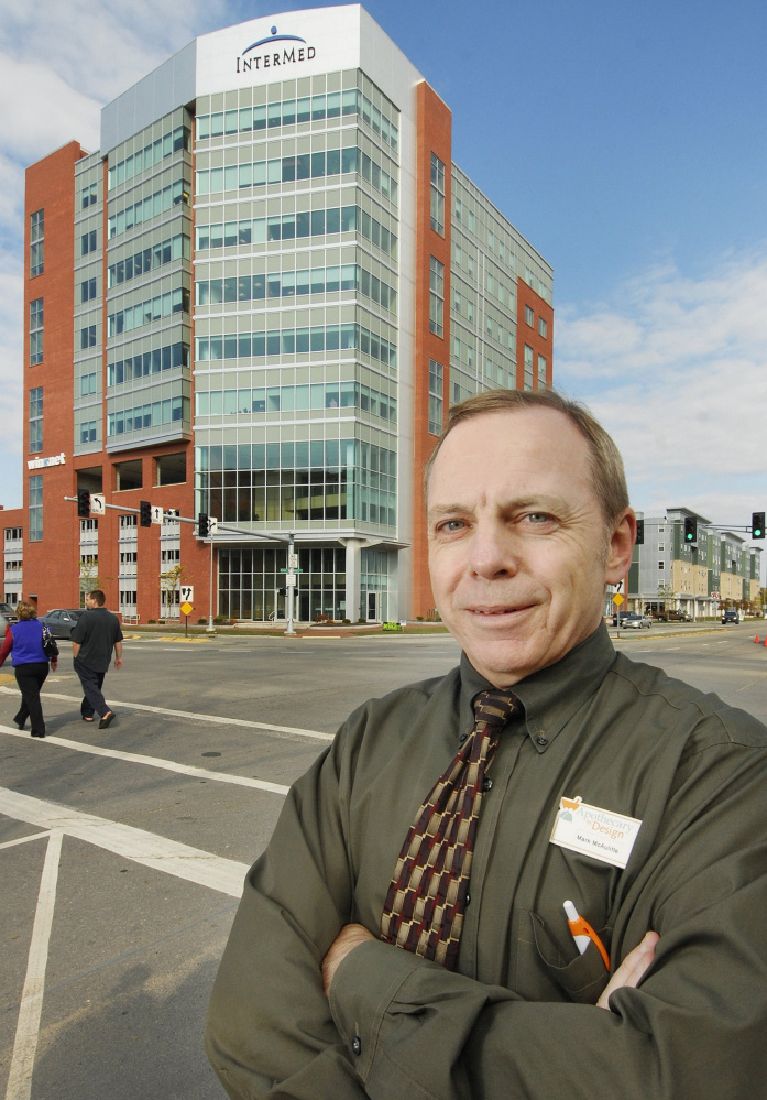 Chief executive Mark McAuliffe stands outside Apothecary by Design’s retail pharmacy, located in the InterMed building in Portland.