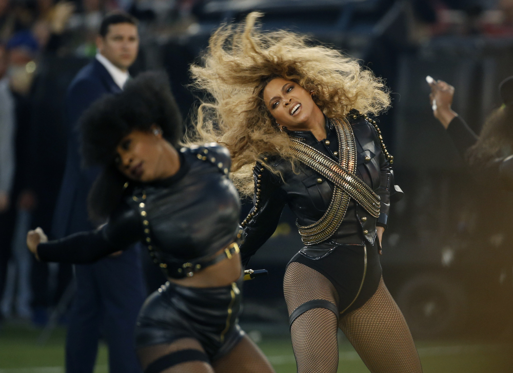 The Associated Press
In this Sunday, Feb. 7, 2016 file photo, Beyonce performs during halftime of the NFL Super Bowl 50 football game in Santa Clara, Calif. Beyonce is working overtime this weekend: After releasing a new song Saturday and performing at the Super Bowl on Sunday, she’s announced a new stadium tour. The Grammy-winning singer announced her 2016 Formation World Tour in a commercial after she performed at the halftime show with Bruno Mars and Coldplay.