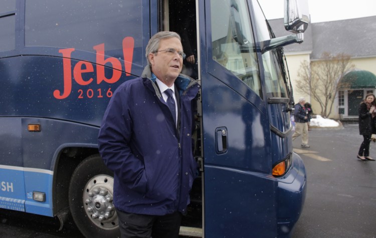 Republican presidential candidate Jeb Bush steps off his bus as he arrives at a campaign event Monday in Nashua, N.H.