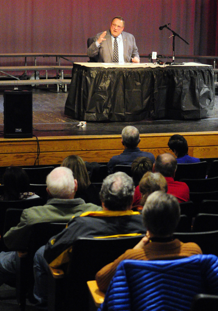Gov. Paul LePage speaks during a town hall-style meeting Tuesday evening at Hall-Dale High School in Farmingdale.