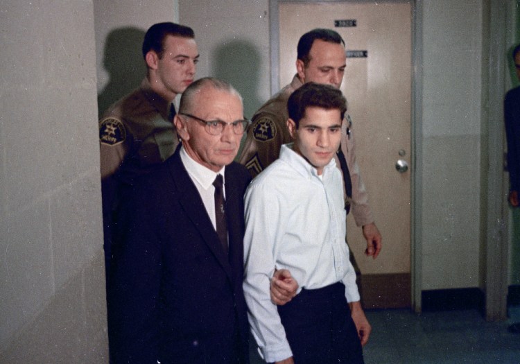 This June 1968 file photo shows Sirhan Sirhan, right, accused assassin of Sen. Robert F. Kennedy, with his attorney Russell E. Parsons in Los Angeles.