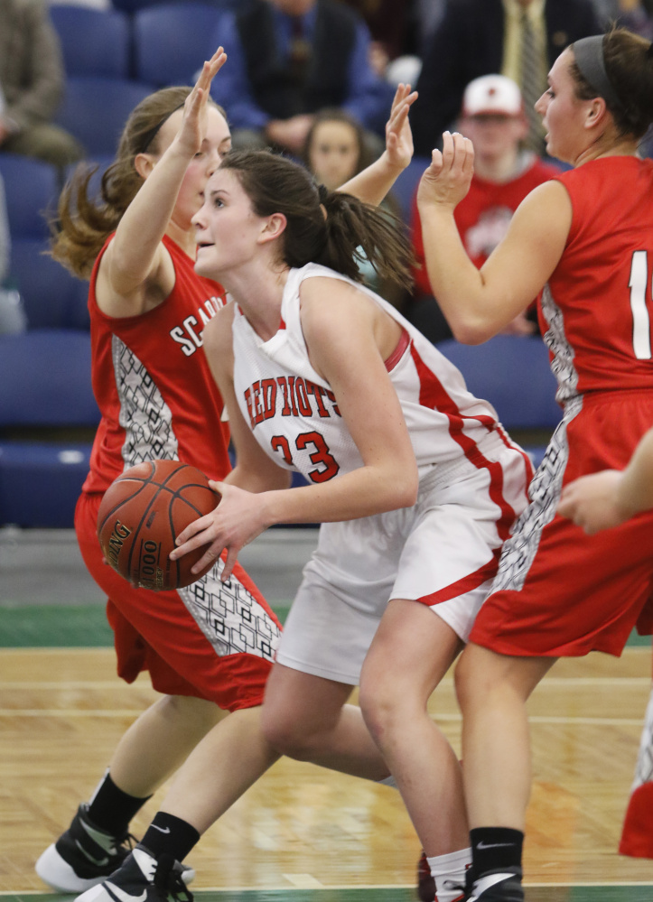 South Portland’s Madeline Hasson finds an opening in Scarborough’s defense during a Class AA South girls’ basketball quarterfinal Wednesday night at the Portland Expo. Hasson scored 14 points in a 49-41 victory.