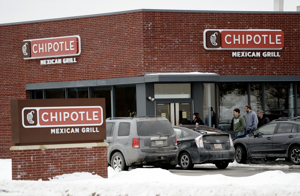 Income for the Chipotle chain plummeted in the fourth quarter but business seems to be hopping at the Chipotle restaurant in South Portland on Wednesday.