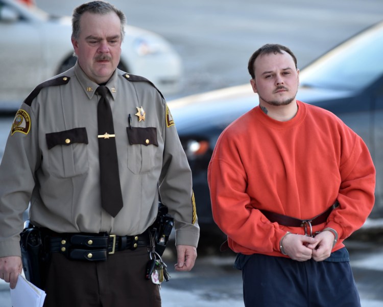 Jason Cote is escorted on Friday into Somerset County Superior Court in Skowhegan for sentencing. Cote, of Palmyra, was convicted in December of murdering Ricky Cole in July 2013 in Detroit. Cote was sentenced to 45 years in prison for the murder.