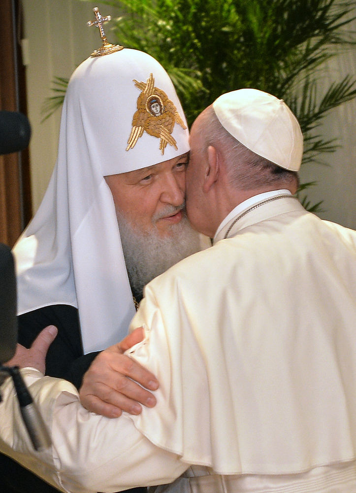 Patriarch Kirill, left, head of the Russian Orthodox Church, kisses Pope Francis as they meet at the Jose Marti airport in Havana, Cuba, on Friday. After the first meeting between a pontiff and the head of the Russian church, Pope Francis flew to Mexico for a weeklong tour.