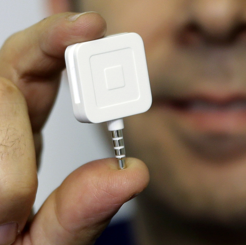 A Square device conducts credit card transactions by plugging into smartphones or tablets for use anywhere.